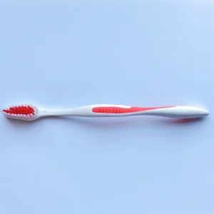Hot Sale Adult Toothbrush with Soft Nylon Bristles and Plastic Handle for Home Use